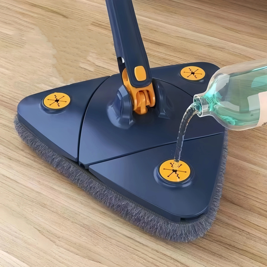 Serpillière télescopique avec réservoir intégré, permettant de nettoyer facilement les sols tout en contrôlant la distribution de liquide grâce à son réservoir pratique